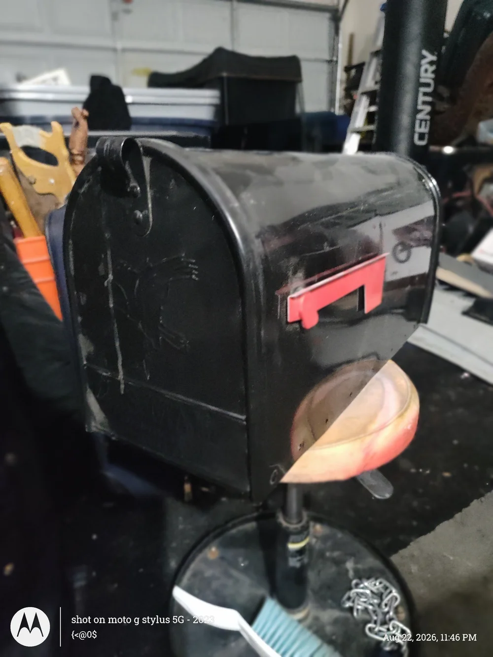 Source Unknown Black Mailbox with Red Flag
